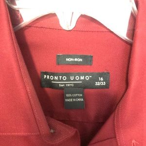 Red dress shirt. Fits a size XL.